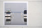 Pinch River unframed 17cm x 17cm Photographic Print on Paper Titled: Lakeside Cruising #2. The subject of the print is pelicans and boats docked at a marina with reflections on the still lake water. Top view.