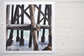 Pinch River unframed 17cm x 17cm Photographic Print on Paper Titled: Underneath the Jetty #4. The subject of the print is a close-up of the iconic Catherine Hill Bay Jetty from underneath, with the weather-worn timber pilings. Top view.