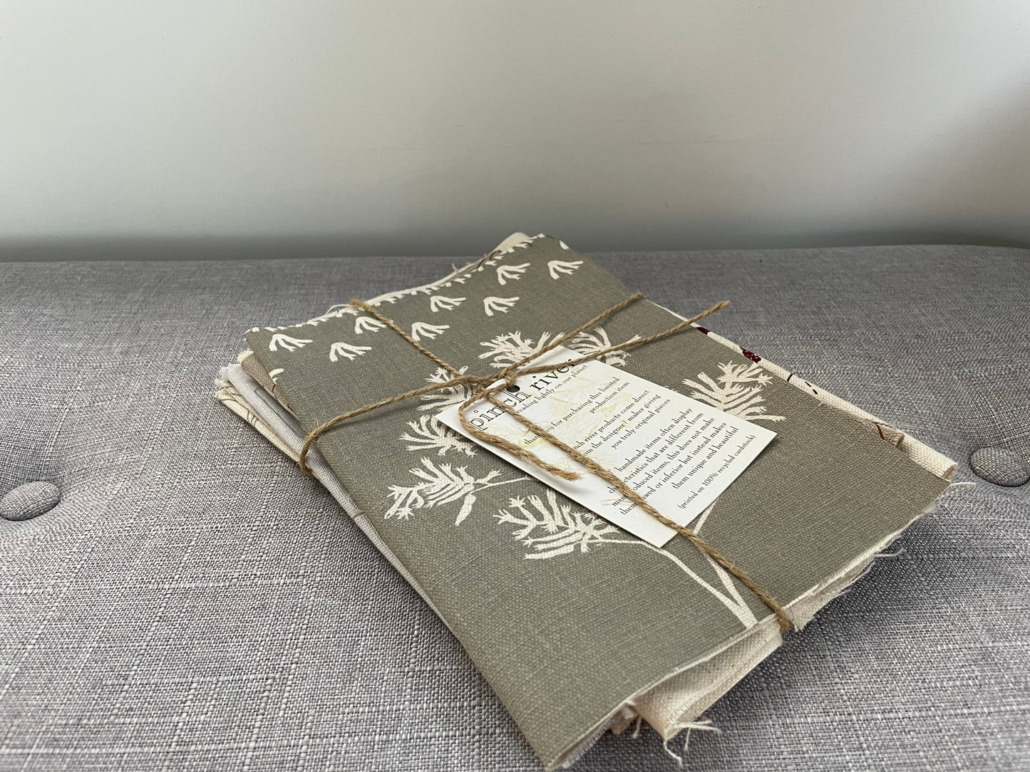 Pinch River handprinted fabric off-cut / fabric remnant bundle No. 1. Side view.