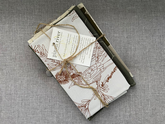 Pinch River handprinted fabric off-cut / fabric remnant bundle No. 3. Top view.