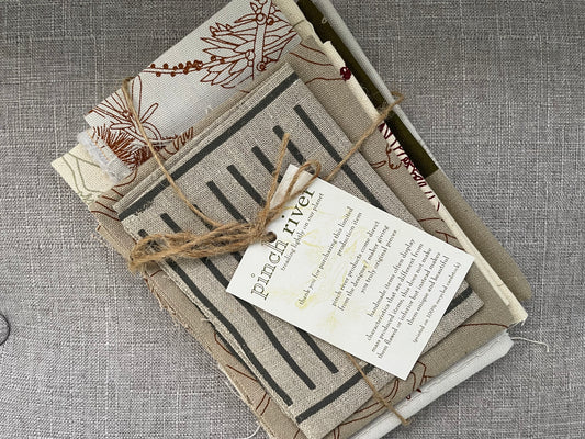 Pinch River handprinted fabric off-cut / fabric remnant bundle No. 4. Top view.