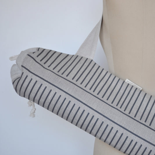 Pinch River yoga mat bag in Corduroy Pathway print in Grey Bark on Natural Linen (colourway 2), on dressmakers dummy. Close-up view.