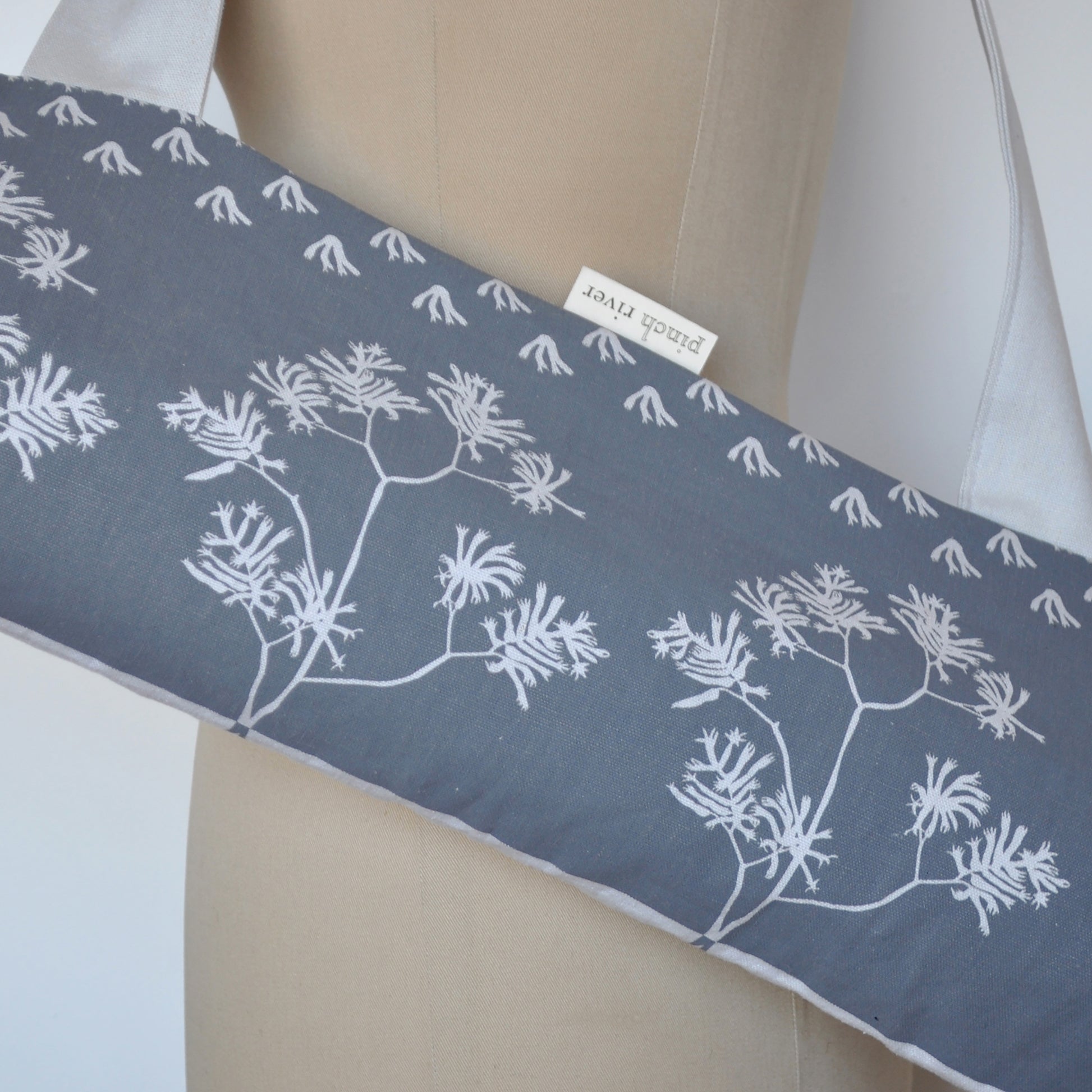 Pinch River yoga mat bag in Kangaroo Paw print n Tempest on Silver Ash (colourway 3_v1), on dressmakers dummy. Close-up view.