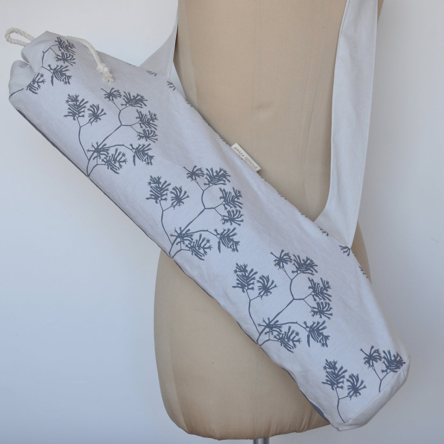 Pinch River yoga mat bag in Corduroy Pathway print in Tempest on Silver Ash (colourway 3_v2), on dressmakers dummy. Full view.