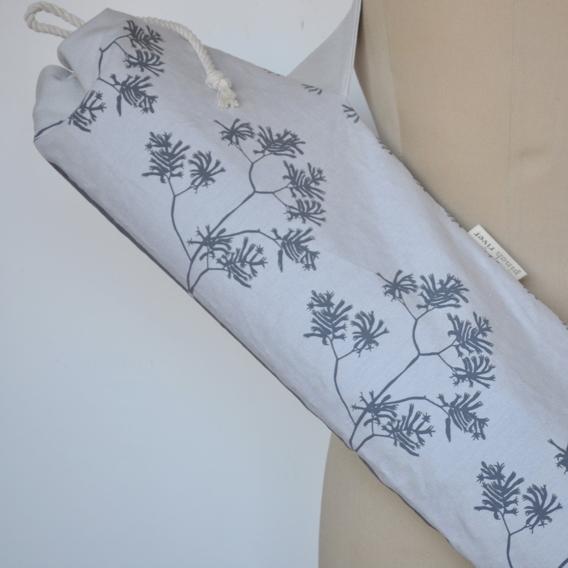 Pinch River yoga mat bag in Corduroy Pathway print in Tempest on Silver Ash (colourway 3_v2), on dressmakers dummy. Close-up view.