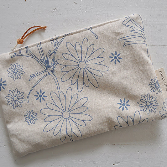 Pinch River zipper pouch featuring Brachycomb print in Horizon Blue (colourway 1). Top view.