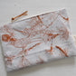 Pinch River zipper pouch featuring Wattle Bird print in Burnt Orange (colourway 2). Top view. 